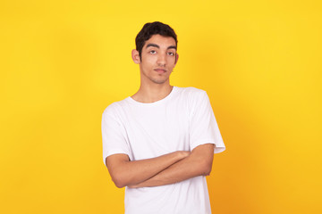 young male teenager isolated on color background