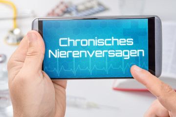 Smartphone mit dem Text Chronisches Nierenversagen auf dem Display