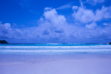 tropical beach with blue sky