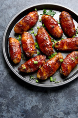 Bacon wrapped grilled chicken wings