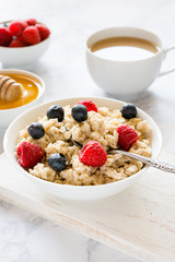 Oatmeal with berries for breakfast in a bowl
