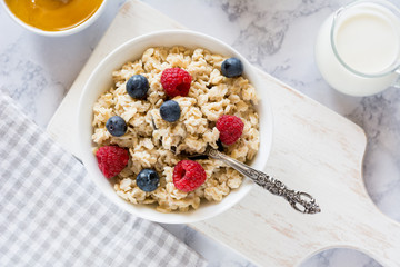 Oatmeal with berries for breakfast in a bowl