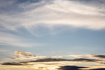 Fototapeta premium beautiful fluffy clouds in the light of morning sun