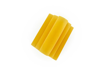 pile of italian raw dry pasta cannelloni isolated on white background. Pasta for baking. top view