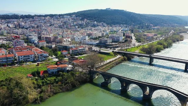 Aerial view of Arta city, Greece. Cityscape of Arta with bridges,  Peloponess