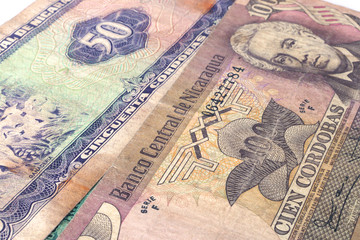Banknotes in denominations of hundred and fifty. One hundred and fifty Nicaraguan cordobas. African bills. African money