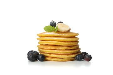 Tasty pancakes with fruits isolated on white background