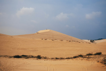 Fototapeta na wymiar White Sand Dunes Muine in Vietnam with tourists