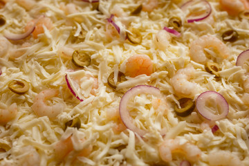 Hot italian pizza on a table with vegetables