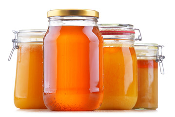 Fototapeta na wymiar Composition with large jars of honey