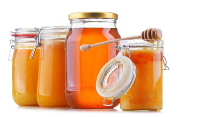 Composition with large jars of honey