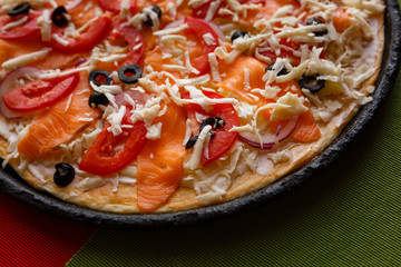 Raw pizza in a pan. Italian food cooking