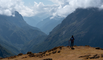 Active hiker in travel to Everest  enjoying the valley view in Himalaya mountains  landscape