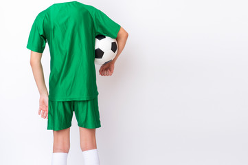 Kid play with soccer ball over white background. Kid activities.Training game concept.