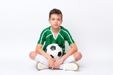 Kid play with soccer ball over white background. Kid activities.Training game concept.