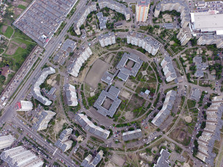 Soviet planning residential areas. The school building is surrounded by houses for protection from the wind (drone image) in Kiev ,Ukraine