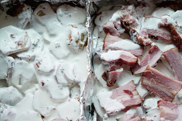 Close up food photography.  Potatoes with cream and bacon for lunch. 