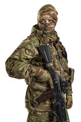 One soldier holding assault rifle. Uniform conforms to sub-unit of Russia's special forces Alpha Group FSB. Shot in studio. Isolated with clipping path on white background