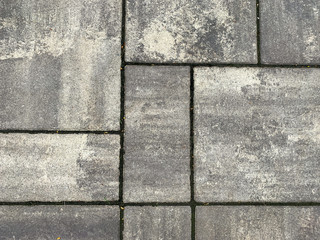 Grey, textured stone wall or floor background pattern.