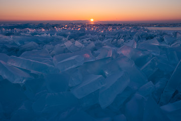 Obraz premium Baikal frozen lake in winter season in a morning sunrise view from Uzury bay, Siberia, Russia