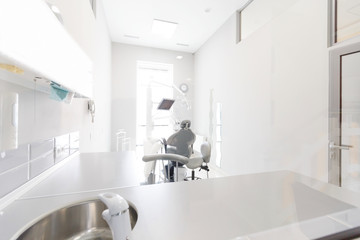 White dentistry room with professional equipment and tools for tooth treatment