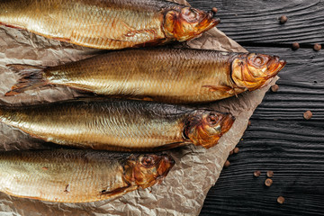 
fish on black wooden background