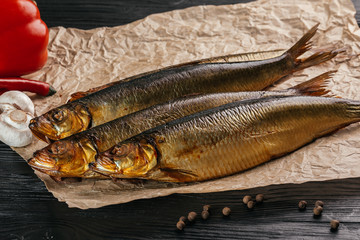 
fish on black wooden background
