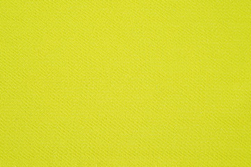 A fragment of a light green chiffon photographed in close-up.
