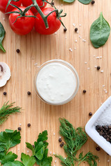 Blue cheese sauce on a wooden table, top view