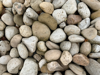 Close-up photo of smooth rocks. Stone background.