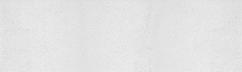 White washed rough plastered wall wide texture. Light painted textured cement surface. Whitewashed abstract widescreen background