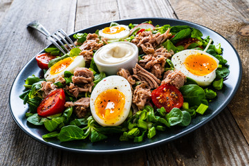 Tuna salad on wooden table
