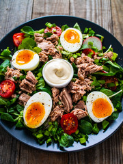 Tuna salad on wooden table
