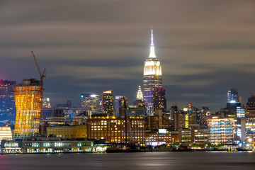 Fototapeta na wymiar Manhattan Skyline ,waterfront and skyline viewed from the Hudson River Hoboken NJ, New York,USA 