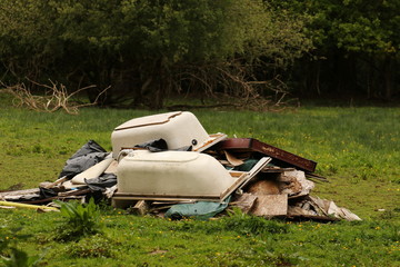 Fly tipped rubbish pile.