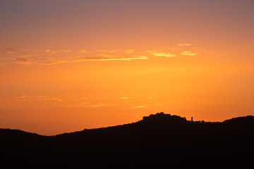 Sunset over village of Sant'Antonino in Corsica