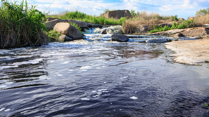 Cascading waterfall on a sunny day