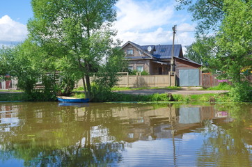 Obraz premium City of Pereslavl-Zalessky, Yaroslavl region. Summer view of the Right embankment and the Trubezh river. Golden ring of Russia