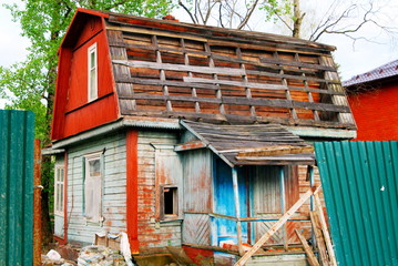 an old wooden ruined house