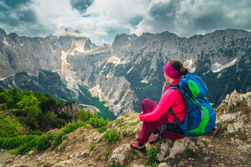 Hiker woman on the top of mountains, Julian Alps, Slovenia