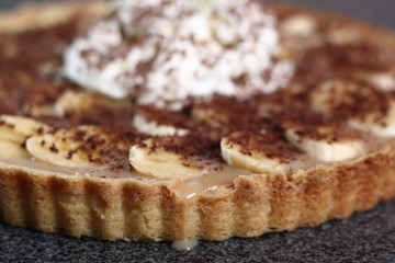 Boston Banoffee Pie. Biscuity Shortcrust Pastry with Caramel Fudge Filling and Banana Topping.