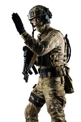 Soldier holding assault rifle. Uniform conforms to special services of the Russian Federation. Shot in studio. Isolated with clipping path on white background