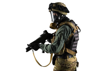 Soldier holding assault rifle. Uniform conforms to special services of the Russian Federation. Shot in studio. Isolated with clipping path on white background