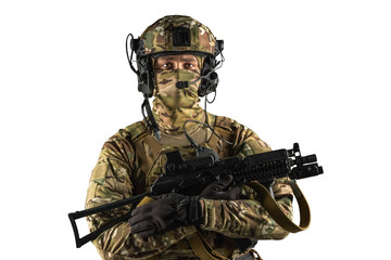 Soldier holding assault rifle. Uniform conforms to special services of the Russian Federation. Shot in studio. Isolated with clipping path on white background