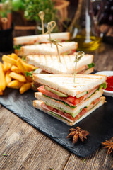 Tasty sandwiches with ham and vegetables