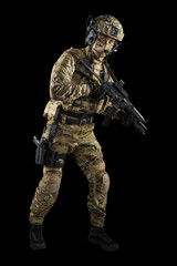 Soldier holding assault rifle. Uniform conforms to special services of the Russian Federation. Shot...