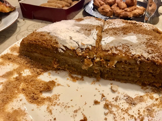 Homemade Russian Medovik Cake with Honey, Cinnamon and Powdered Sugar.