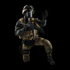 Soldier holding assault rifle. Uniform conforms to special services of the Russian Federation. Shot in studio. Isolated with clipping path on black background