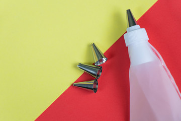 pastry bag and nozzles on the kitchen on the table, pastry set
