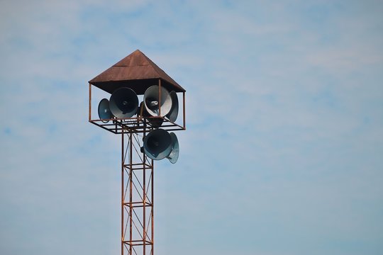 Horn speaker for public relations with blue sky In the countryside of Thailand.